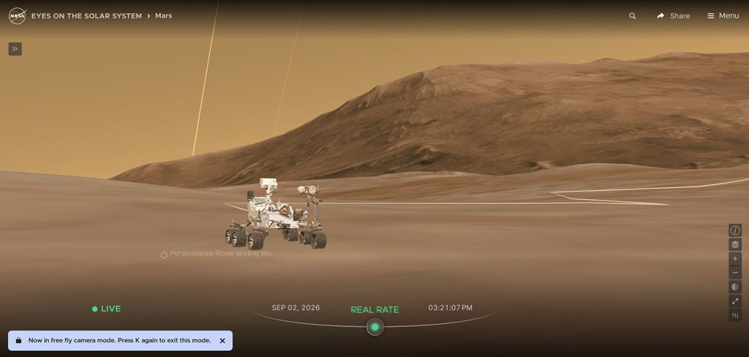NASA Eyes screenshot showing a simulated Perseverance rover on the newly available three-dimensional Mars terrain
