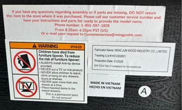 The tracking and production label under the recalled dresser's top panel